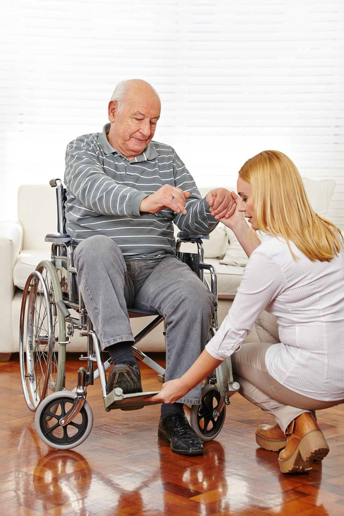 Physiotherapy with Senior Man in Wheelchair